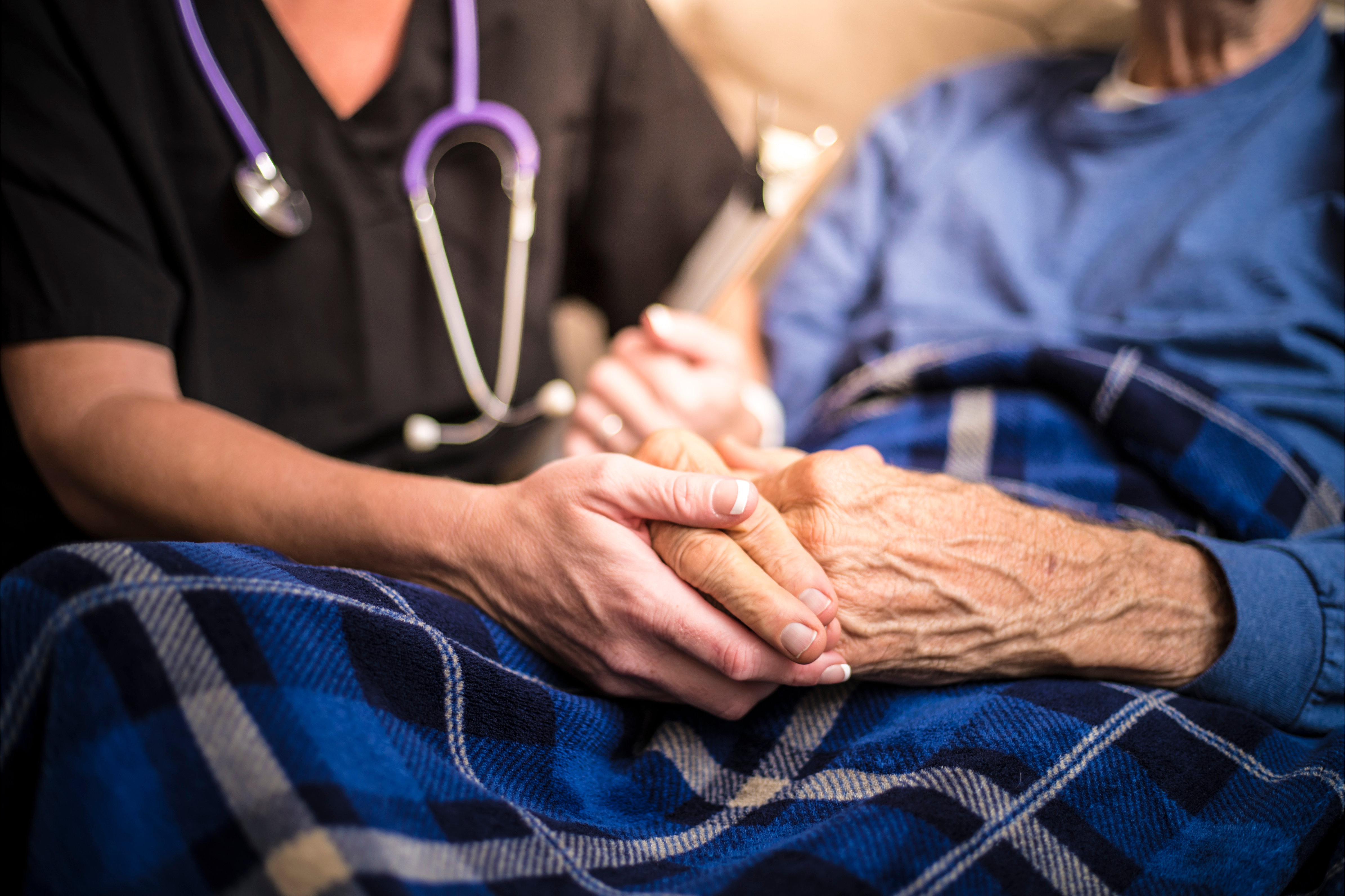 Private duty home care nurse attends to elderly client